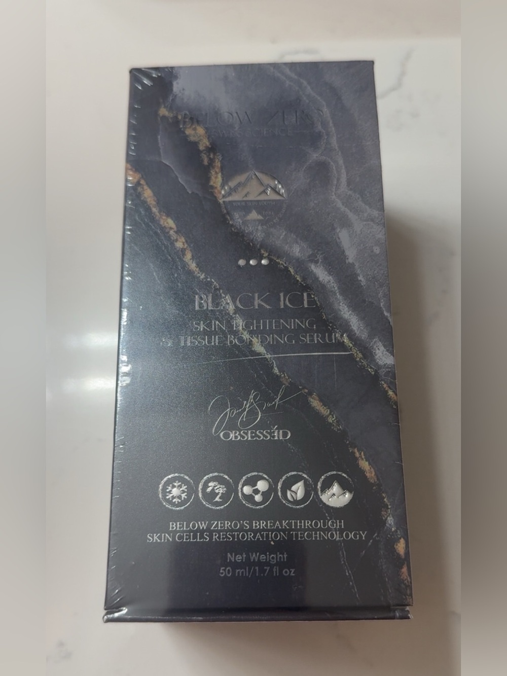 Black Ice Skin Tightening Serum - Black & Gold Packaging